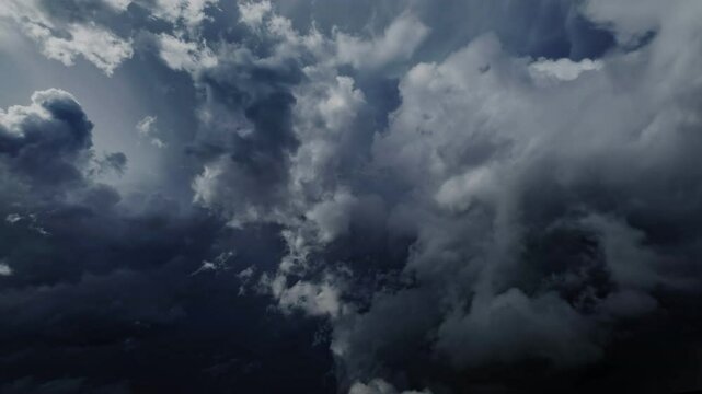 Lot of lightning during a thunderstorm. Storm clouds are moving fast on the viewer, timelapse 4k