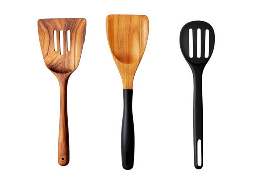 three kitchen spatulas made from different materials a wooden spatula with a natural finish. a bamboo spatula. and a black silicone spatula these utensils are designed for flipping. serving. and cooki