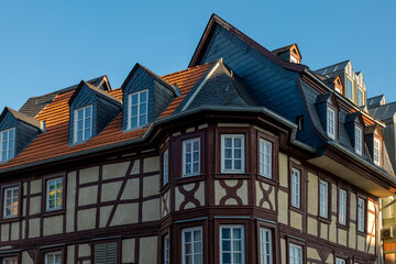 Elegant architecture of a historic building showcasing traditional European design in a clear blue sky