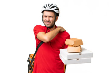 Young handsome caucasian man with thermal backpack and holding takeaway food over isolated background suffering from pain in shoulder for having made an effort