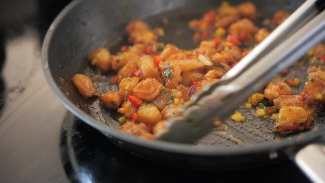 Flamb&eacute; shrimps being cook in pan (Caribbean)