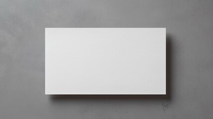 Fototapeta premium A white card with a grey background