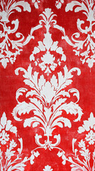 The image features a rich red background adorned with an intricate white damask pattern