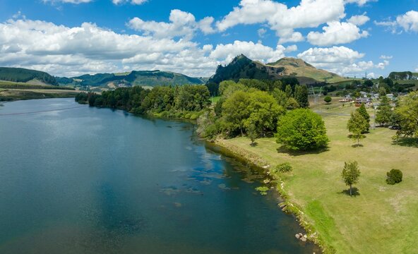 Aerial view of a river with a containment boom. Environmental cleanup in progress. Protecting the waterway. WHAKAMARU-AOTEA, WHAKAMARU, WAIKATO, NEW ZEALAND