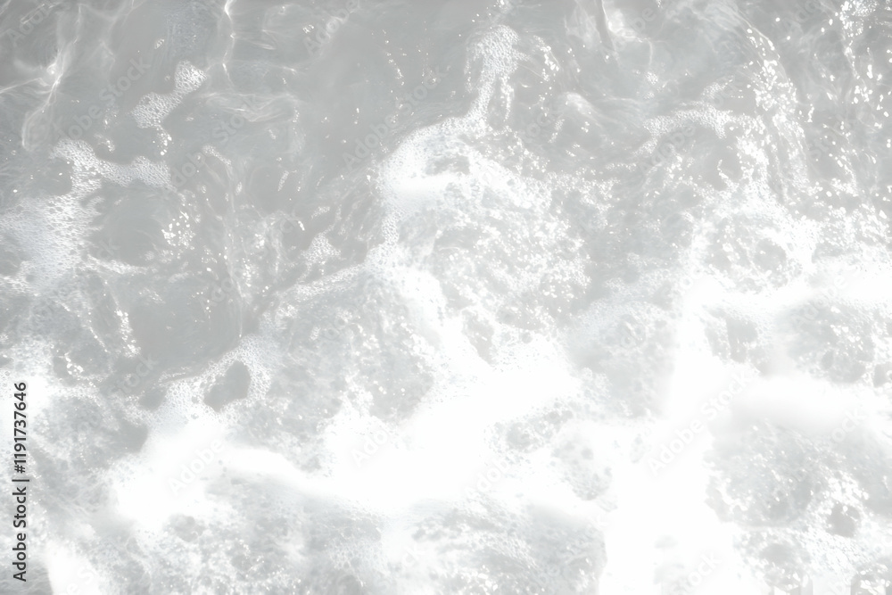 Poster white water surface with bubbles creates a textured and abstract background with gentle ripples