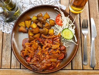 Tulacka - beef roast beef with smoked lard, dried sausage and cucumber. Slovak cuisine