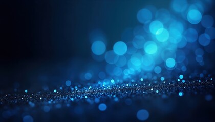 Blue abstract background with light blue bokeh. Dark blue tones create deep, elegant ambiance. Blue glitter texture surface adds depth, sophistication. Stylish design with various shades of blue.