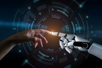 Human and robotic hand reaching, glowing orb symbolizes futuristic connection