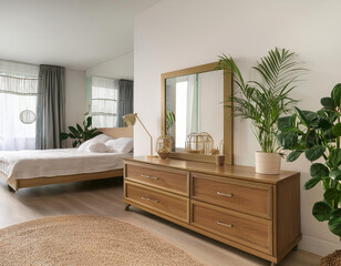 mirror dressing table houseplant bed and chest of drawers indoors interior design