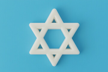 white 3D Star of David isolated blue background