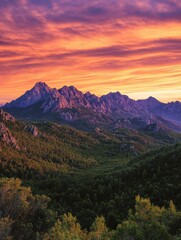 Obraz premium Majestic mountain peaks illuminated by the vibrant hues of sunrise over a lush landscape. Generative AI