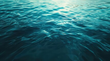Obraz premium A serene view of rippling water, reflecting light and creating a tranquil atmosphere.