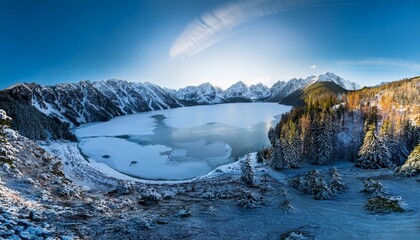 frozen lake morskie oko or sea eye lake in poland at winter panoramic view