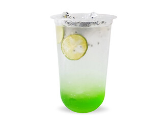 Green apple mojito or cocktails on a takeaway plastic cup with ice and lime slice isolated on white background with clipping path. Spring or summer refreshing mocktail with lime, green soda lemonade.