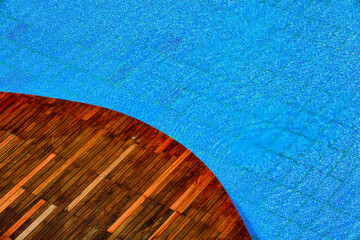 Wooden floor by the swimming pool
