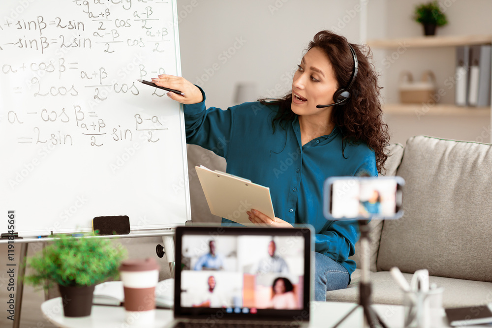 Poster online lecture concept. young lady professor making video conference with students, pointing at boar