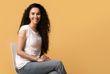 After Vaccination Concept. Portrait Of Beautiful Vaccinated Arab Woman Showing Arm After...