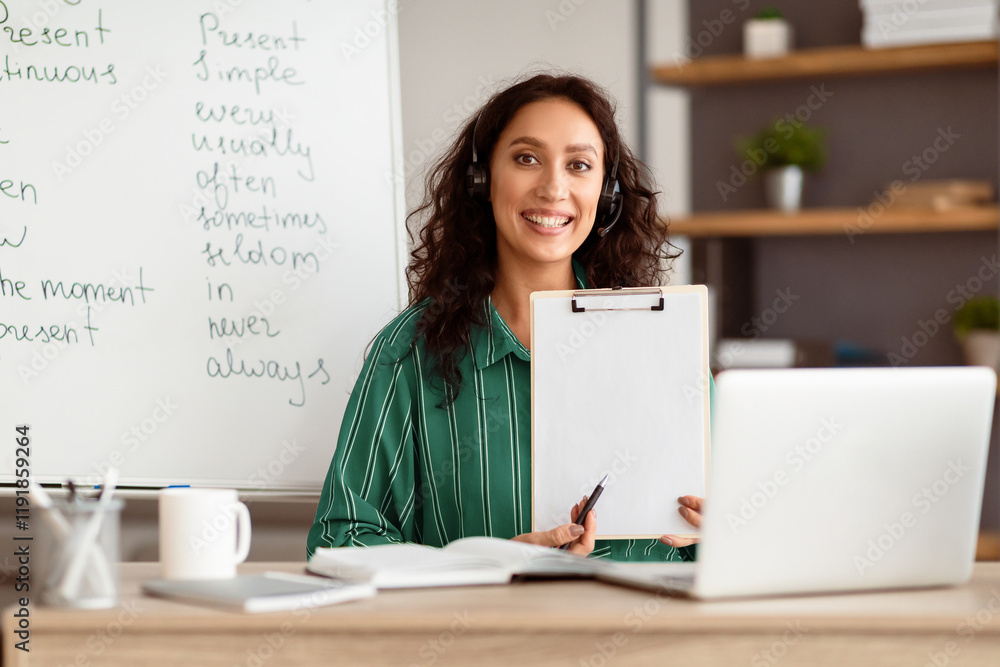 Poster smiling lady manager having videocall, looking at camera, giving virtual presentation or online less