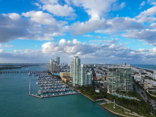 Naklejka premium Luxury view on Miami south beach marina with docked yacht boat and high skyscraper architecture