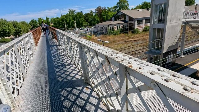 Rusty Metal Bridge Over Train Tracks