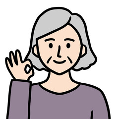 OKポーズをするシニア女性