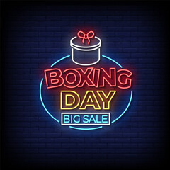 Naklejka premium boxing day neon sign style with brick wall background vector