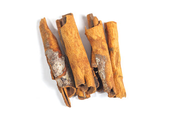 Cinnamon stick isolated on white background. Cinnamon bark is a spice obtained from the inner bark...