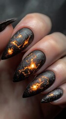 Fototapeta premium Stylish weld-themed nail art showcasing melted iron textures, glowing sparks, and industrial factory-inspired finishes.