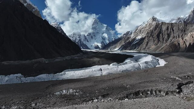 Aerial drone flight towards K2 in Pakistan among the Karakoram Mountains, the world's second highest peak.