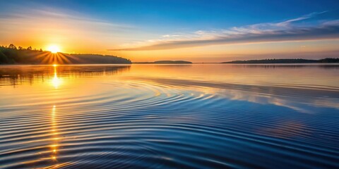 Fototapeta premium Waves on a calm lake at dawn with sunlight filtering through the surface creating a mesmerizing sound wave pattern in the water , peaceful, reflection