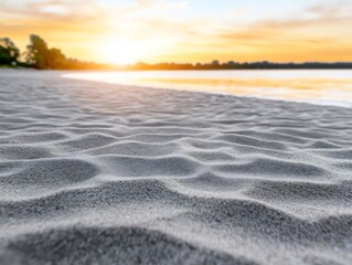 Fototapeta premium Serene sunset casts warm light on gently rippled beach sand. AI Generated