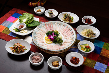 Fresh raw fish and Korean side dishes