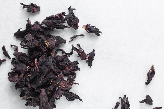 Overhead view of dried roselle, top view of dried hibiscus and Sorrel flowers, ingredient for making nigerian zobo drink