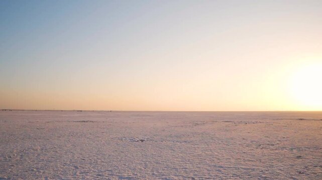 White rann of Kutch during sunset at Rann Utsav festival during winter season. Tourism and Holidays concept. Salt mars landscape of Kutch desert.