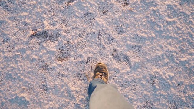 POV shot of girl walking on white salt flats in Kutch, Gujarat, India. Tourist exploring White Rann Of Kutch during Kutch Rann Utsav. Travel and Holidays concept.