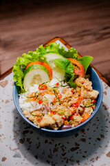 Chicken ricebowl with sambal matah