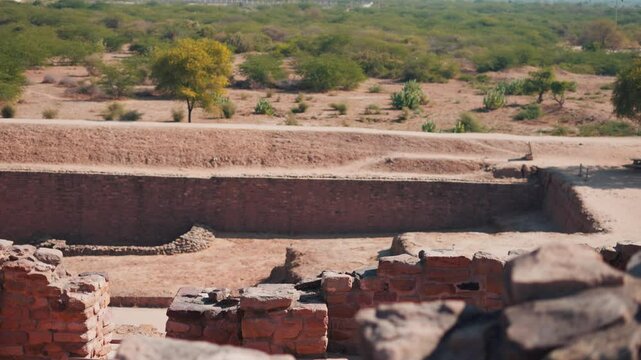 4K shot of ancient civilization ruins of Harappan city in Dholavira, Kutch, India. The ancient city of Dholavira UNESCO World Heritage Centre. Archaeological site of Indus valley civilization.