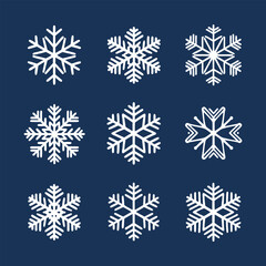 Fototapeta premium Intricate Snowflake Set: Symmetrical Winter Designs on Blue Background