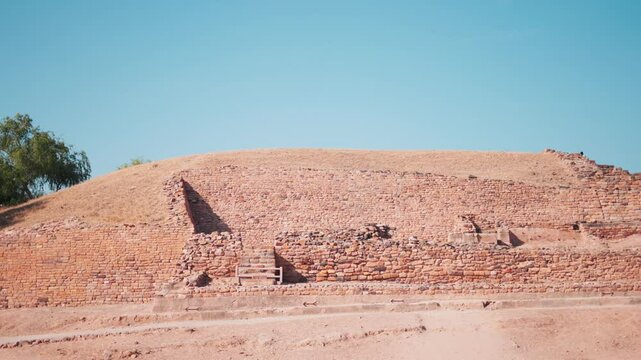 Rocky outcrops surrounding ancient ruins of Indus valley civilization in Dholavira, Kutch, India. The ancient city of Dholavira UNESCO World Heritage Centre. Archaeological site.