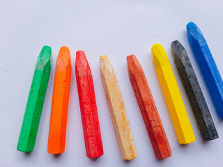 Just above the perspective The white background is separated covering the colored crayons