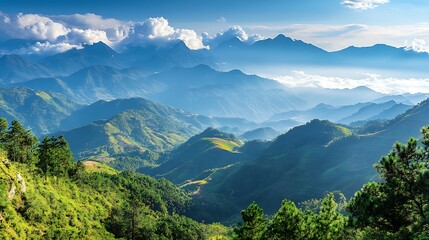 Fototapeta premium Majestic mountain range panorama, sunlit peaks, terraced hillsides, misty valley. Ideal for travel brochures