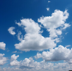 Obraz premium a clear blue sky with only single a solitary fluffy cloud in the center, dreamy and serene atmosphere