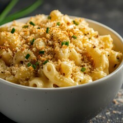 A rich and creamy mac and cheese with a crispy breadcrumb topping and melted cheese, served in a white bowl, Mac and cheese centered
