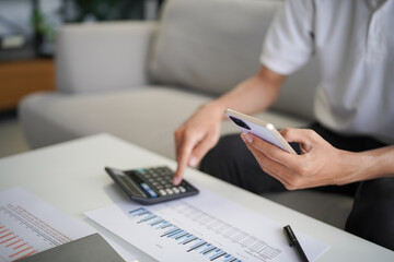 Fototapeta premium Man planning finance for insurance, loan real estate or property.