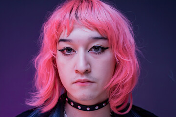 Fototapeta premium Portrait of a non-binary individual confidently expressing their unique style