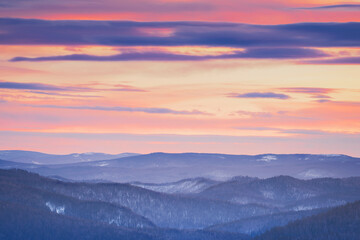 Sunset or sunrise in the mountains A Truly Breathtaking Sunset Over the Majestic and Beautiful Mountain Ranges Awaits You