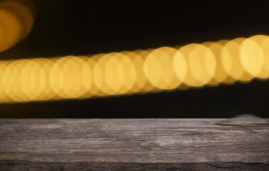 Empty wood table top and blur of restaurant background selective focus product display