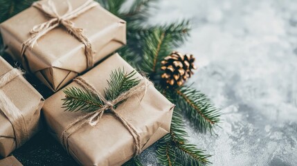 Rustic gifts, pine branches, holiday season, grey background, festive packaging