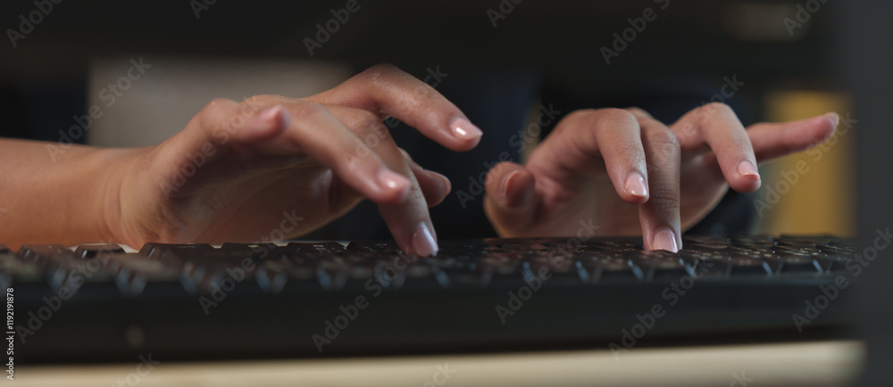 Poster close-up view of hands actively typing on a sleek black computer keyboard, capturing the essence of 