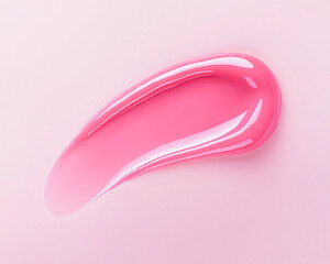 Lip gloss swatch on soft pink background. Close-up of liquid lipstick, glossy texture, horizontal flatlay. Professional studio light